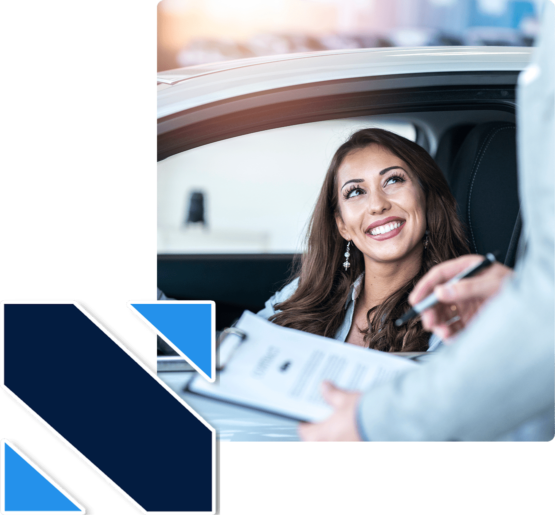 A Sakha Agencies agent reviewing an auto insurance policy with a Las Vegas customer.